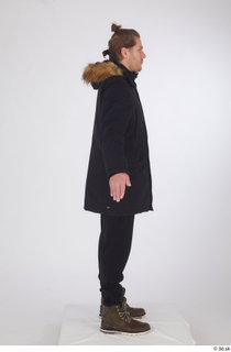  Arvid black coat black joggers black parka brown shoes brown winter boots dressed sports standing whole body 0015.jpg